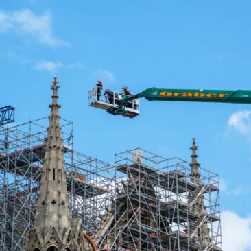 Paris, France - June 16 2020: Workers begin to dismantle Notre Dame de Paris cathedral scaffolding, 14 months after the fire