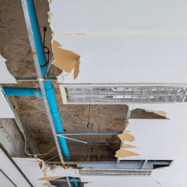 repair leak water pipe on gypsum ceiling interior office building